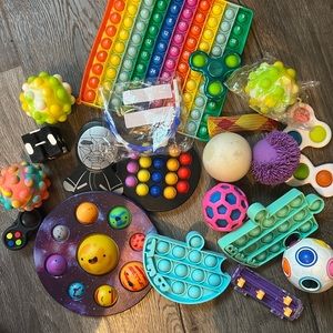 20 Fidgets - few new the rest used in like new condition.